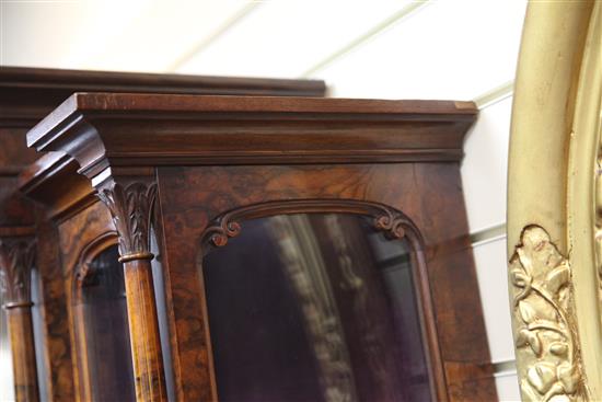 A Victorian burr walnut and marquetry cabinet on bookshelf, by Wilkinson & Son, W.3ft 6in.